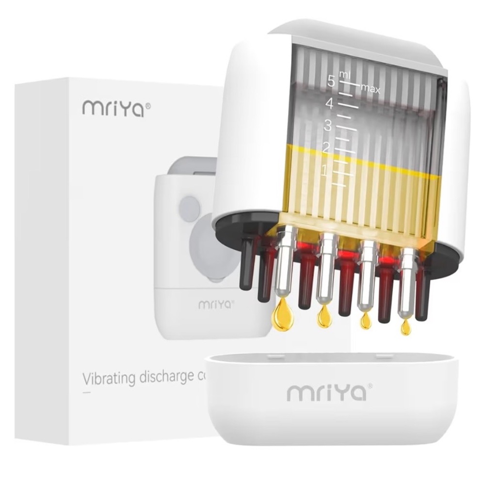 NWT Mriya hair oil applicator.  Electric hair oil applicator with high vibration